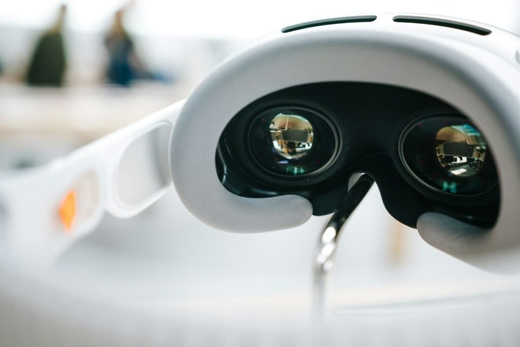 Close-up of smart AR glasses attached to a device, illustrating the rise of AR glasses